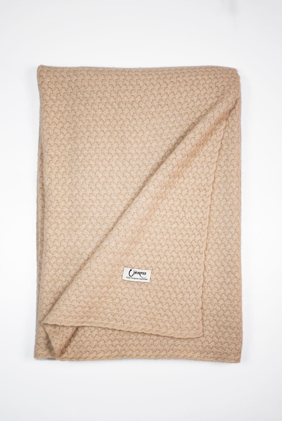 Strikket plaid i 100% cashmere i naturfarven Natural Sand.