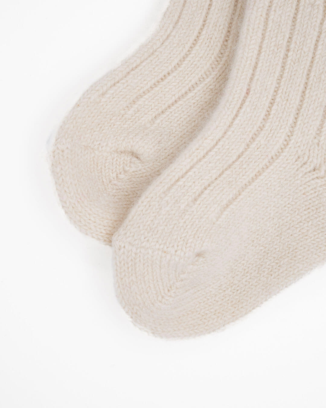 Detail of cashmere baby socks, 0–12 months, from the Eeltei Baylag cooperative in Mongolia.