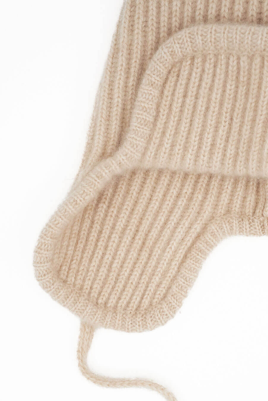 Classic rib knit with ear flaps and ties seen from the front.