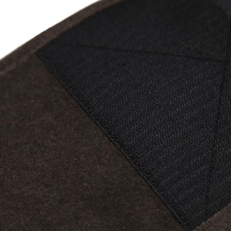 Nærbillede af yakuld lændebælte, der viser den justerbare velcrolukning.