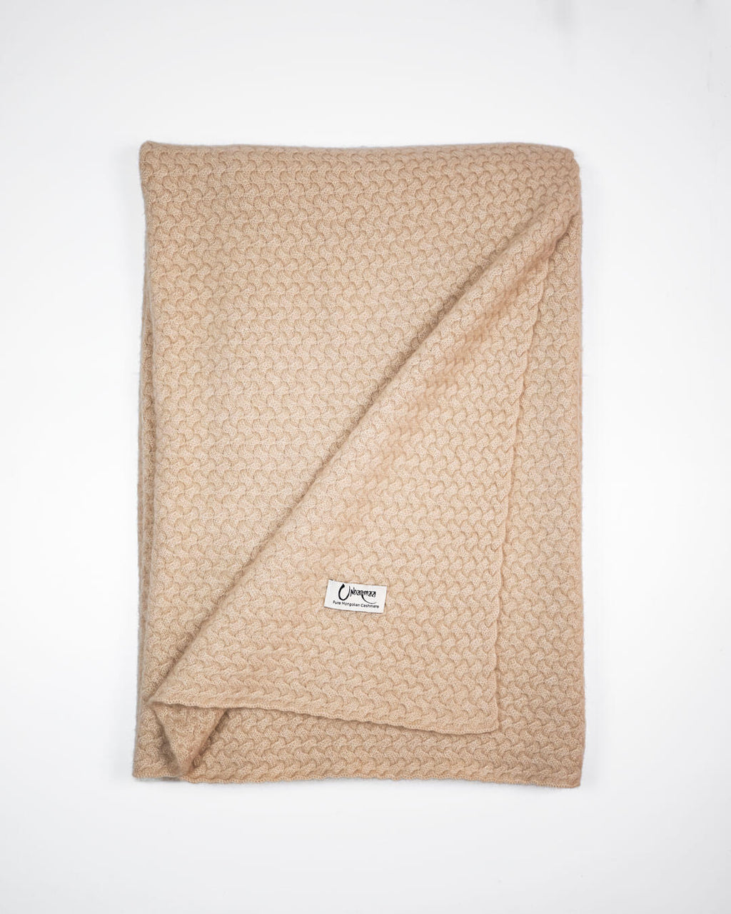 Strikket plaid i 100% cashmere i naturfarven Natural Sand.