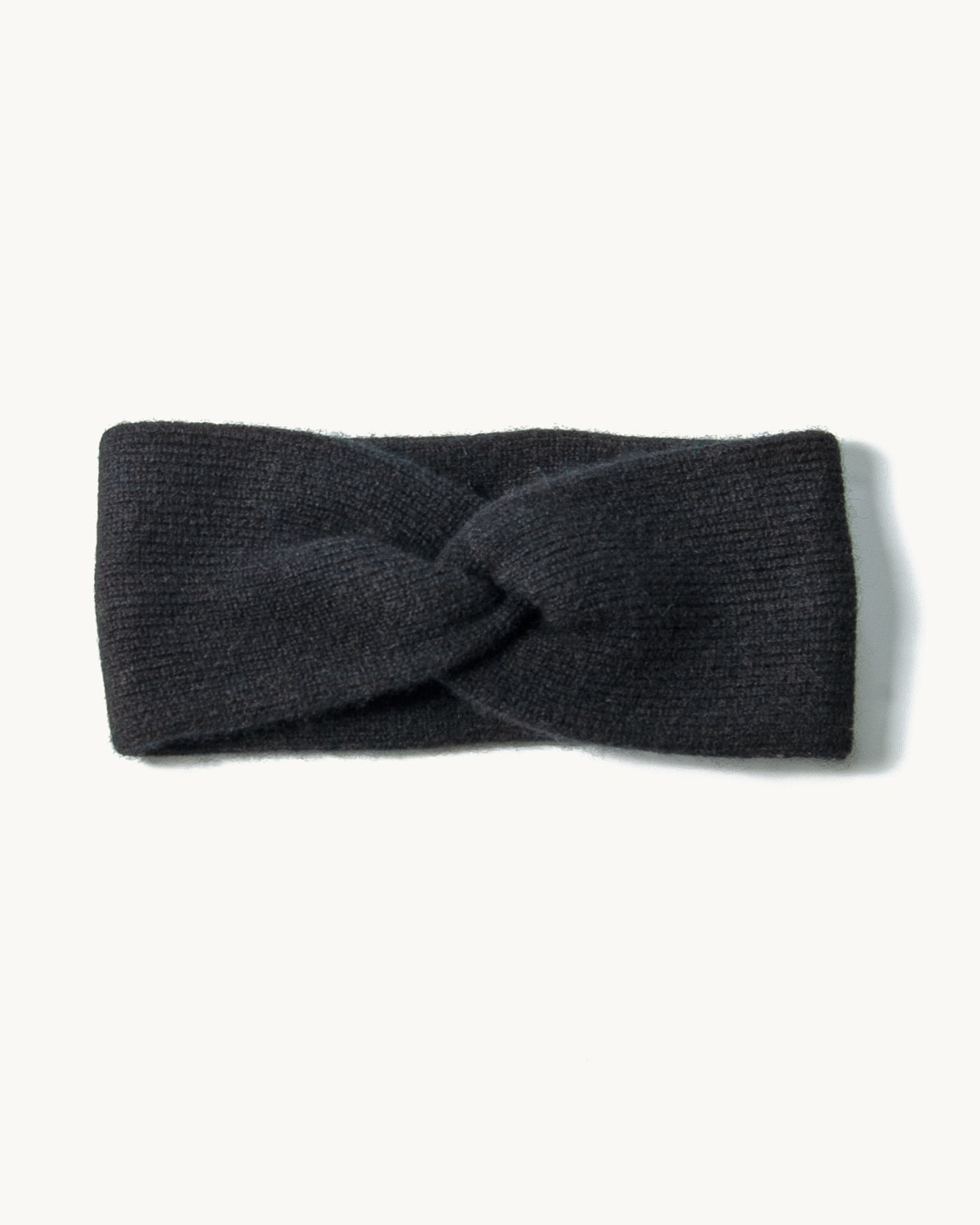 Sammenfoldet cashmere pandebånd i Black.