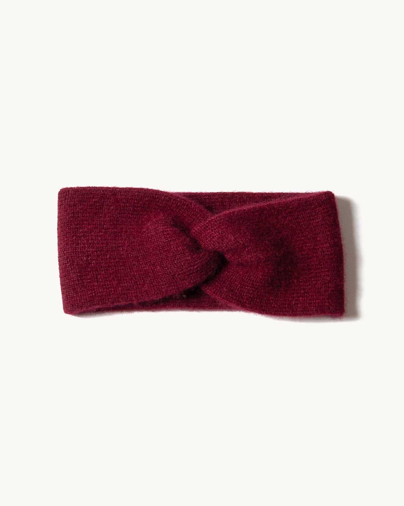 Sammenfoldet cashmere pandebånd i Bordeaux.