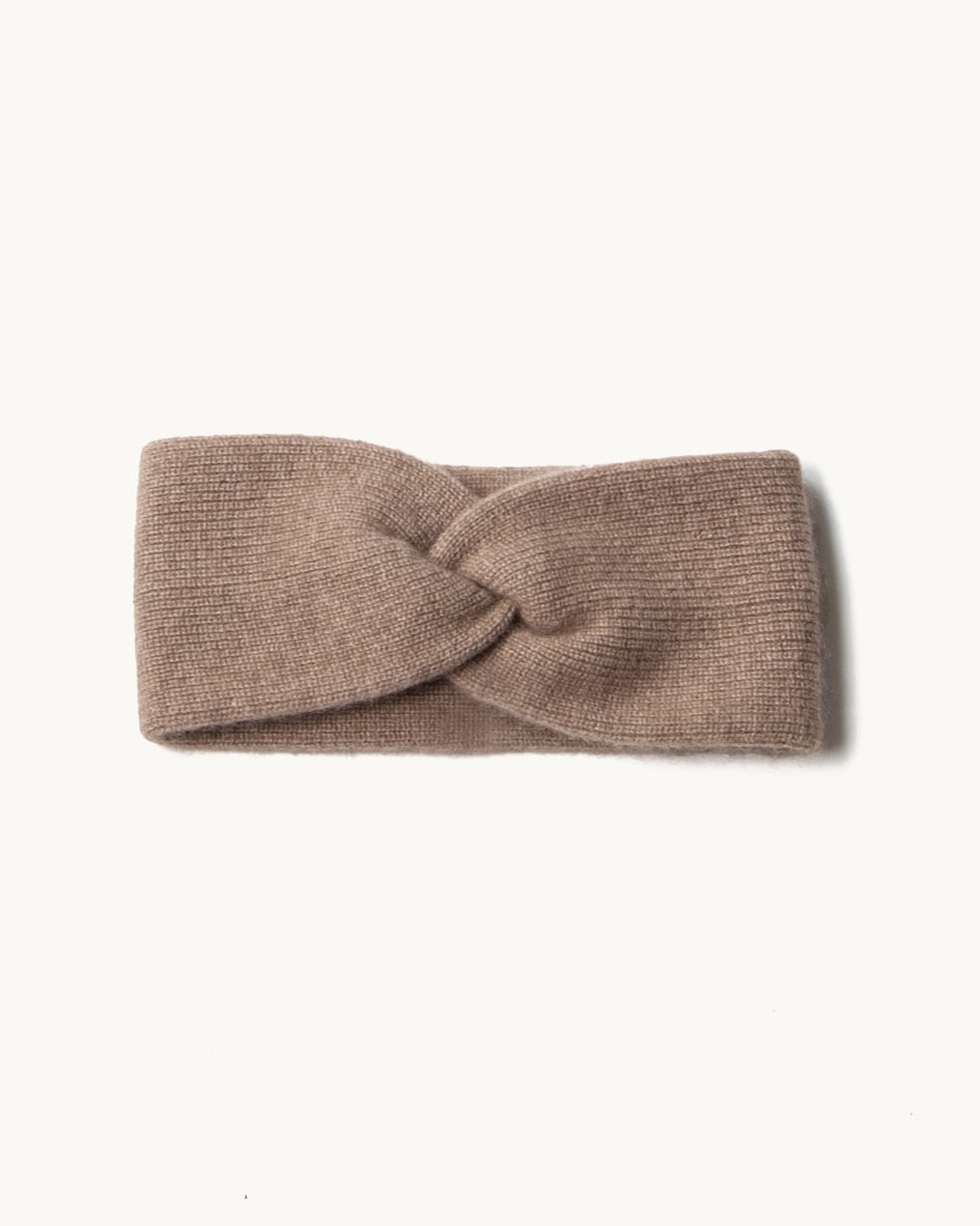 Sammenfoldet cashmere pandebånd i Natural taupe.