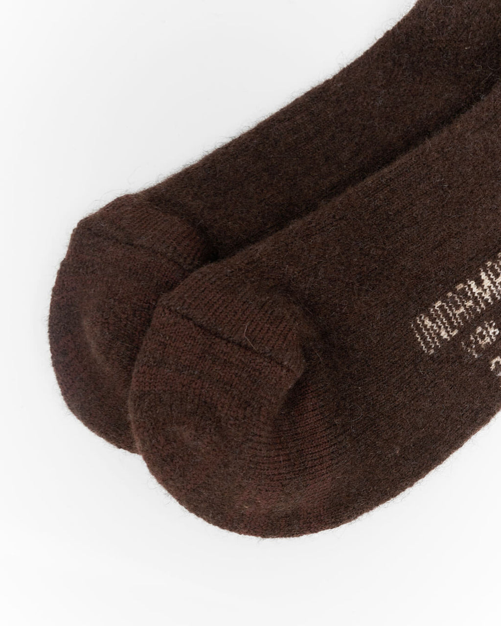 Detalje af tå på yakuld sokker, som viser den tætte strik.