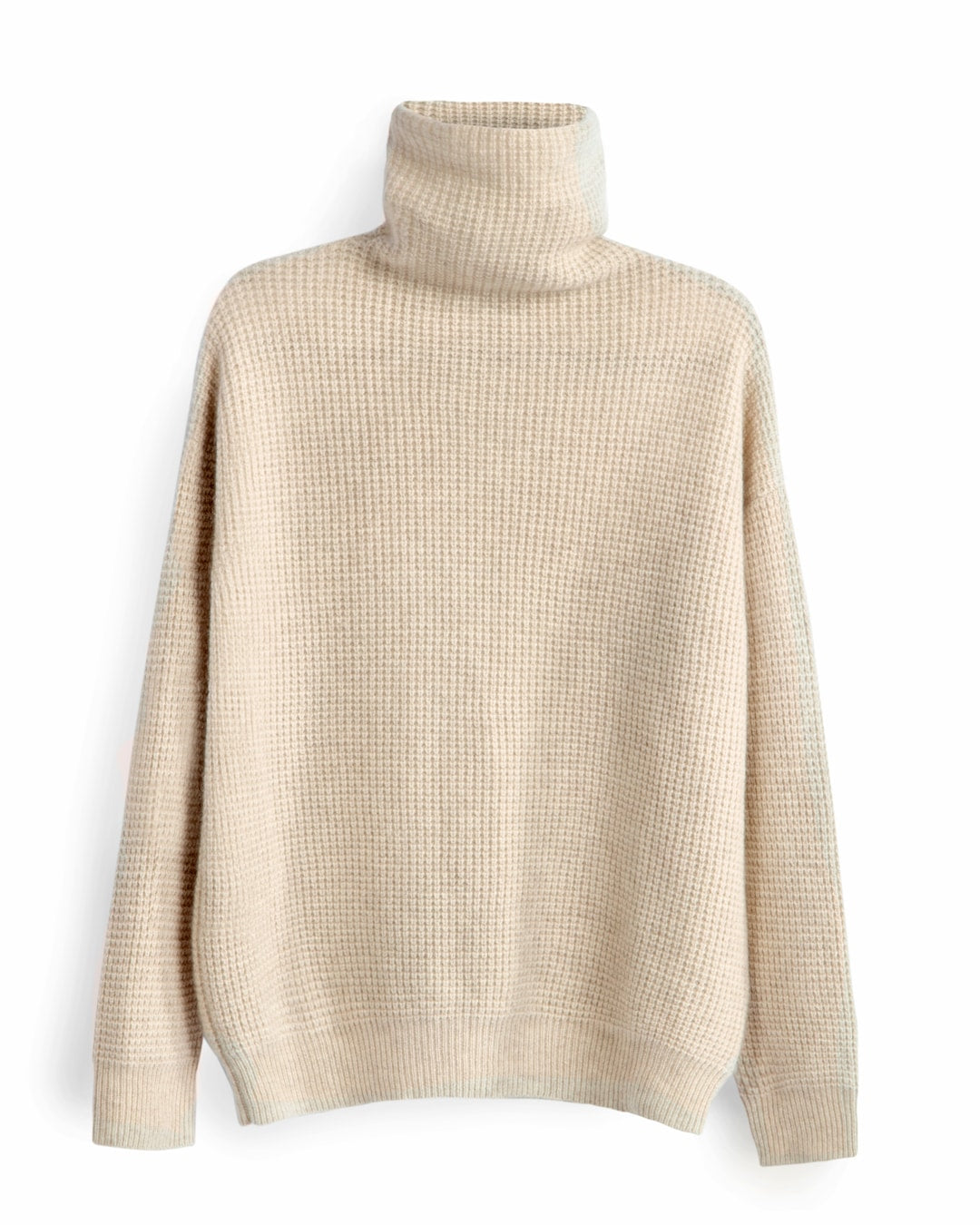 Zaya turtleneck i Natural sand på bøjle.