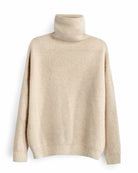 Zaya turtleneck i Natural sand på bøjle.